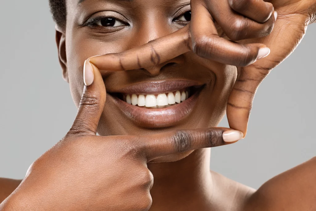 Woman Framing Smile with her hands