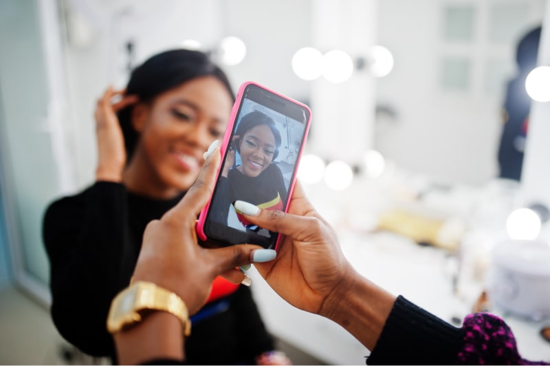 woman posing for camera in salon