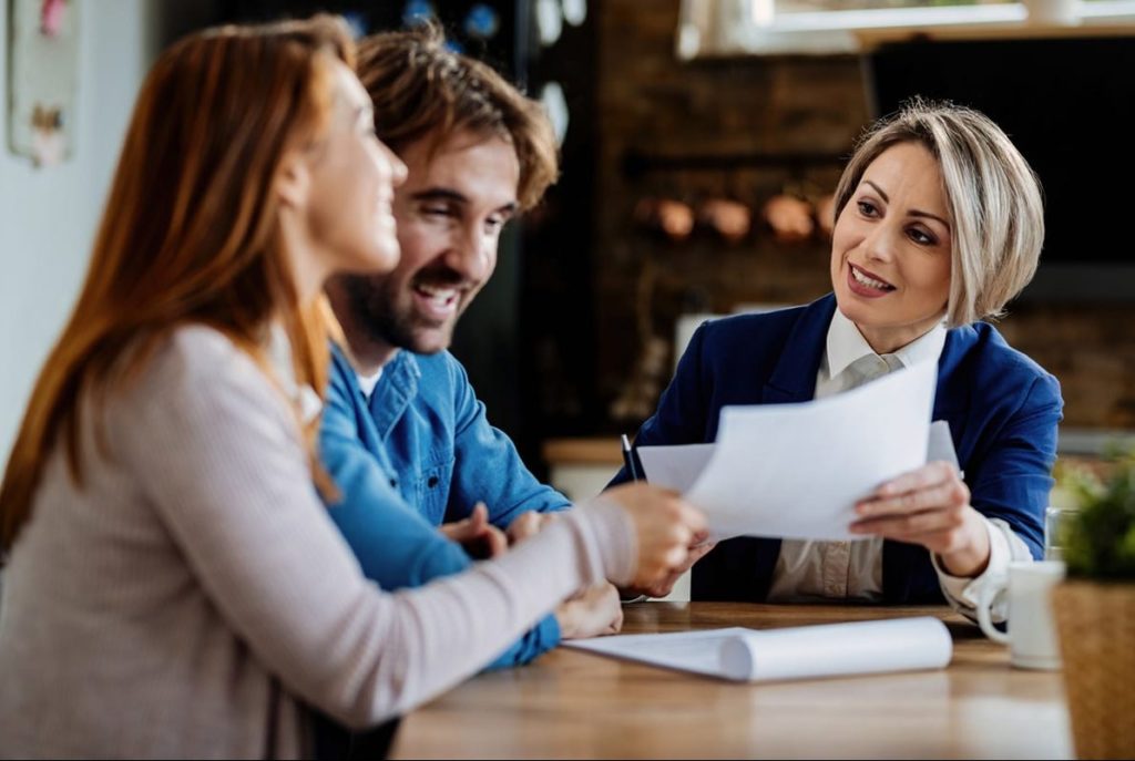 woman showing clients professional liability documents