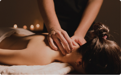 massage therapist giving neck massage