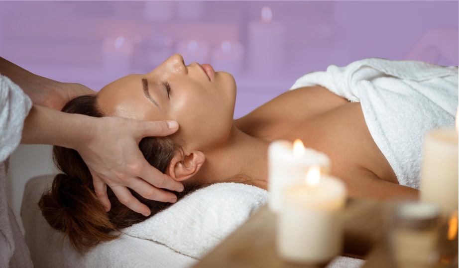 massage therapist giving head massage