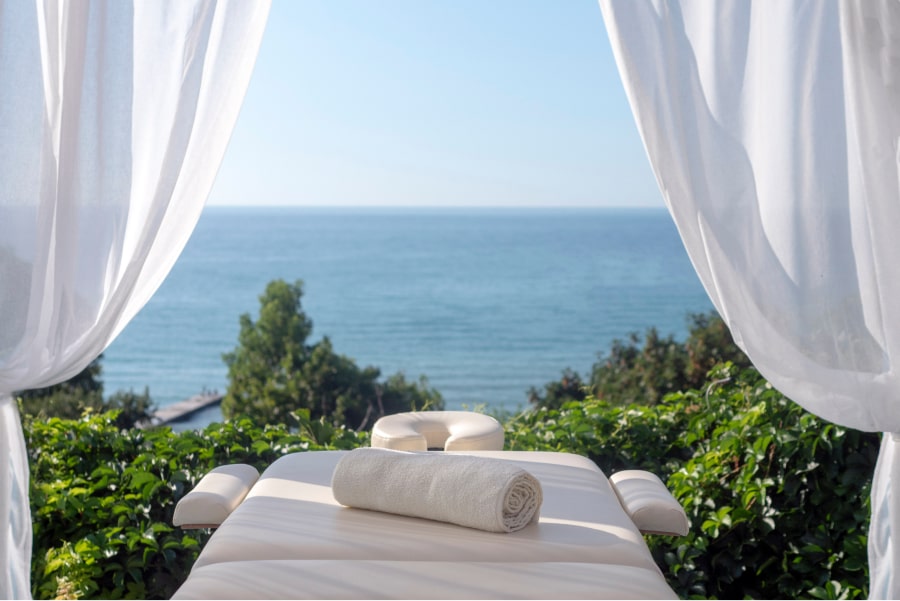 massage table overlooking ocean view