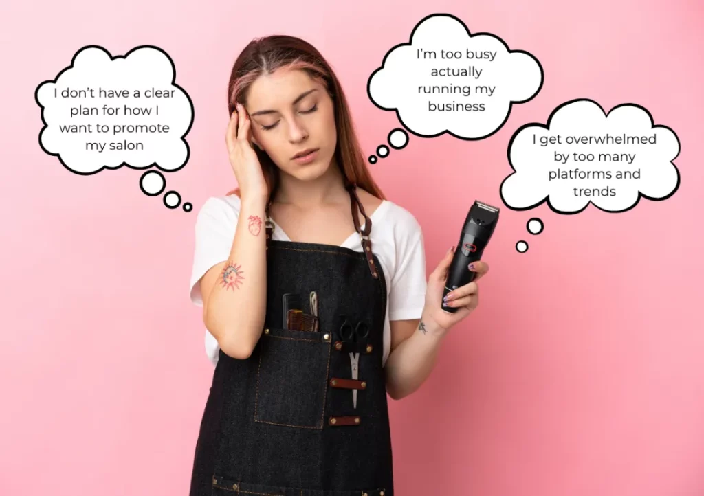 A stressed salon owner wearing a white shirt and a dark blue denim apron rubs her temple and holds clippers while standing against an ombre pink background with thought bubbles surrounding her head, with text including, "I don't have a clear plan for how I want to promote my salon," "I'm too busy actually running my business," and "I get overwhelmed by too many platforms and trends."