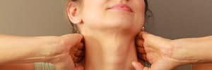 massage therapist stretching neck