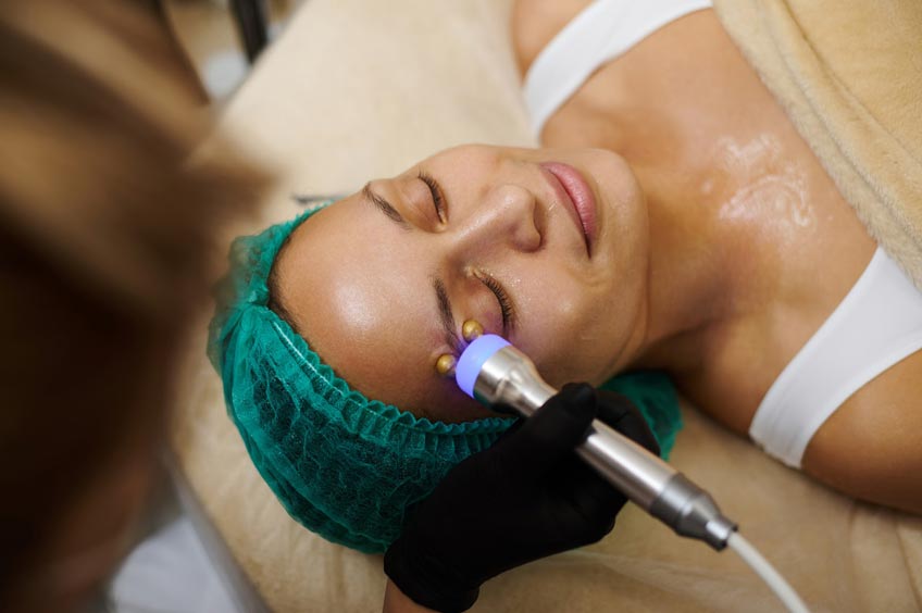 woman getting a microcurrent treatment