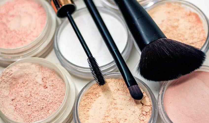 makeup containers and brushes