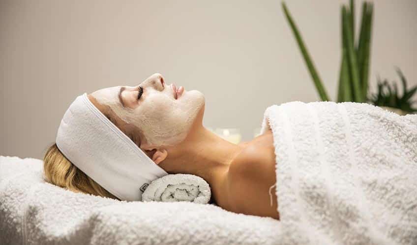 woman relaxing at a spa after a massage