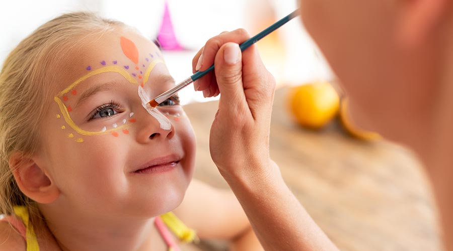 face painter painting little girls face