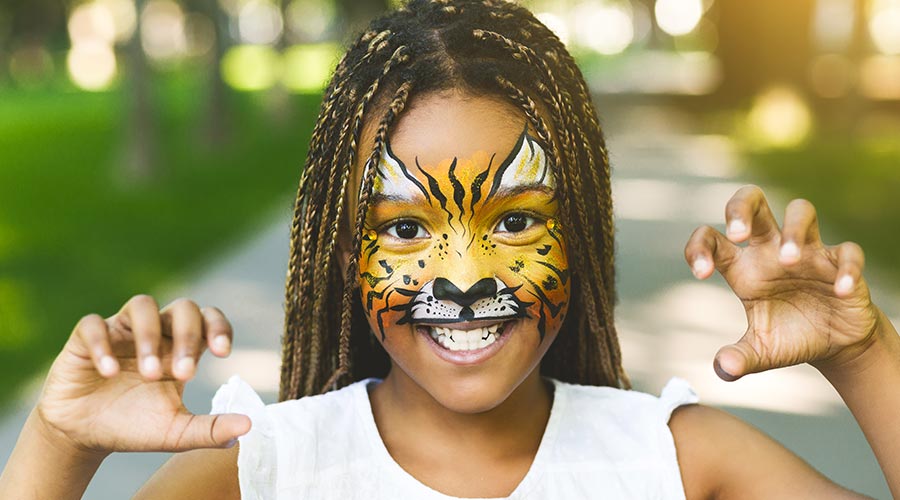 girl with a lion face painting