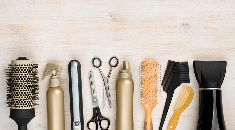 tools for an at home salon business laying on table