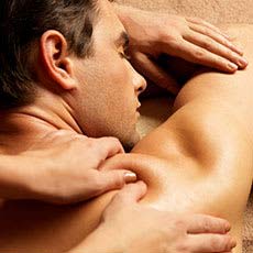 man lying on his stomach getting a deep tissue massage
